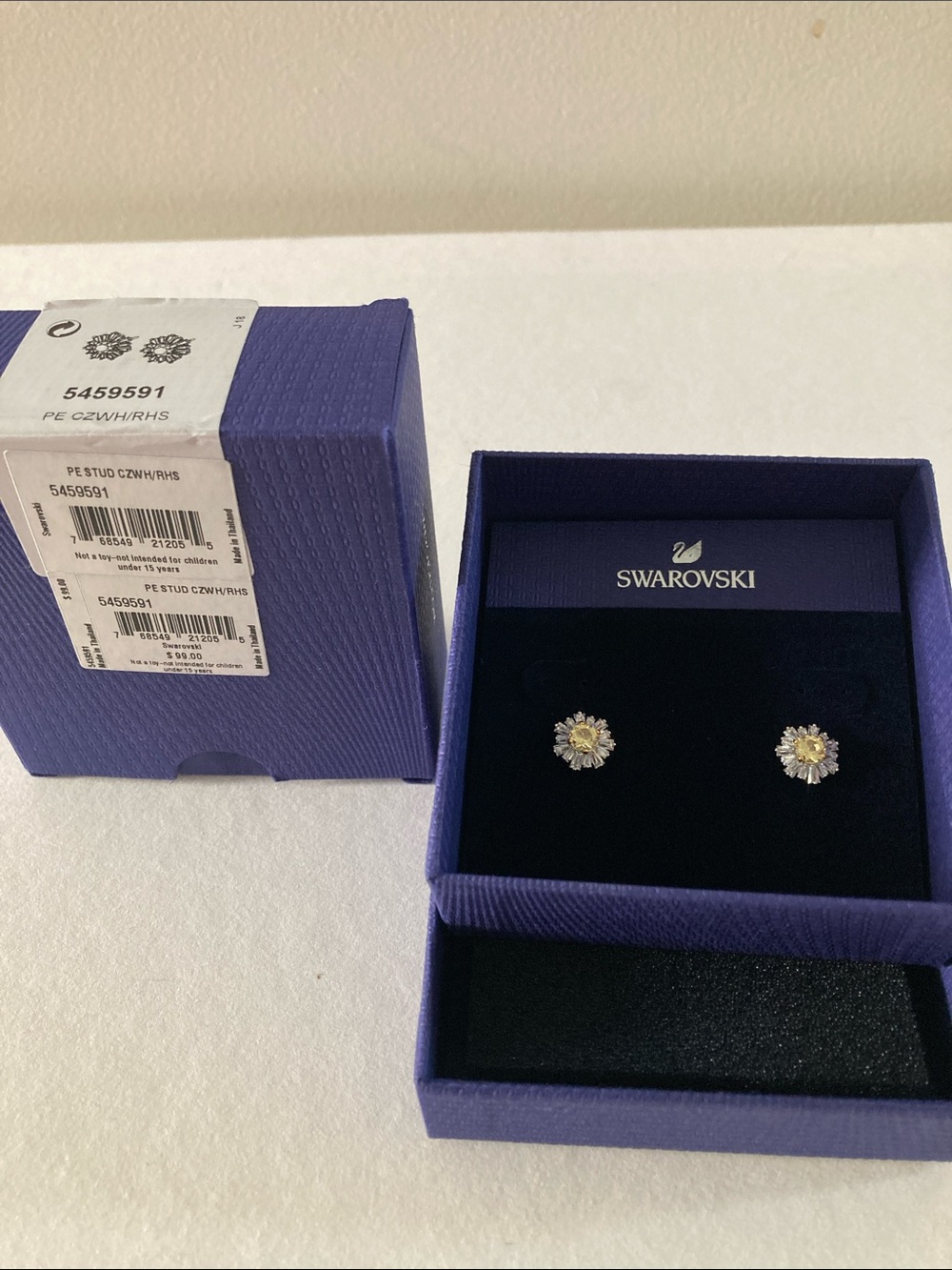 Swarovski crystal sunshine pierced earrings in rhodium plating